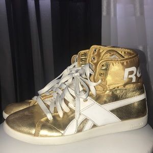 Gold Reebok sneakers